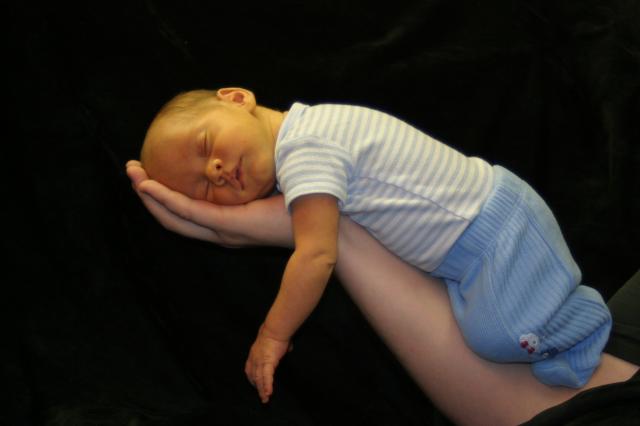 Daddy's arm is the best place to sleep!