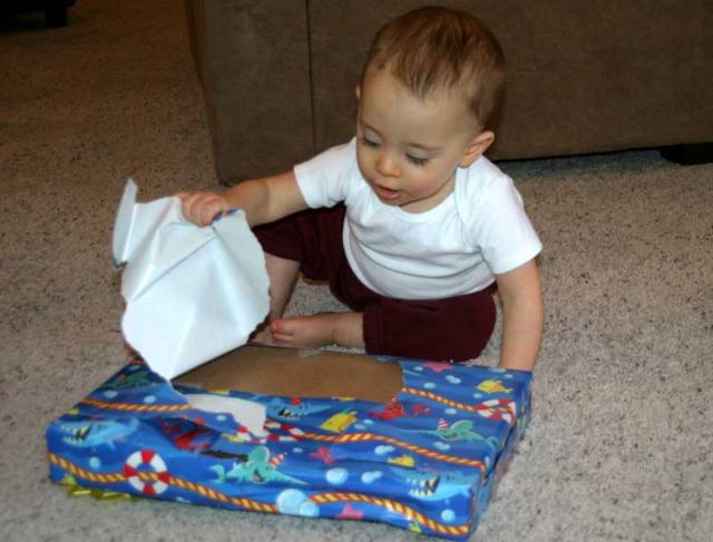 Tearing into Kristin's gift