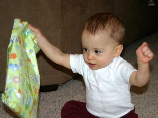 Now tearing into Shelley's gift