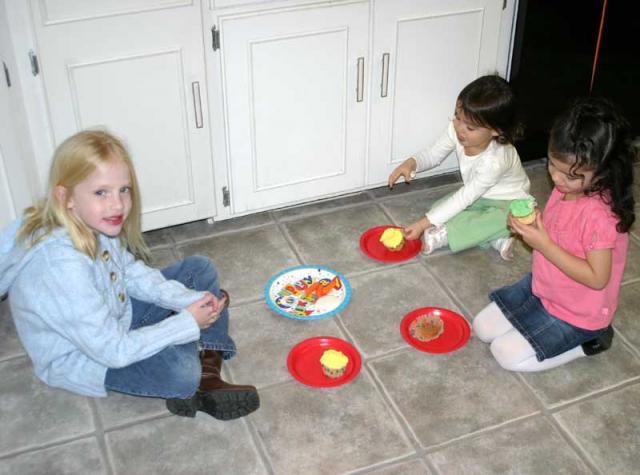 Girls camped out on the kitchen floor