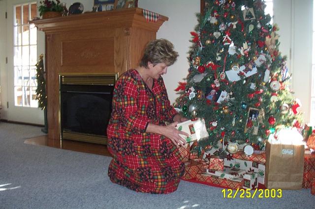 "Mrs. Claus" Handing out Gifts
