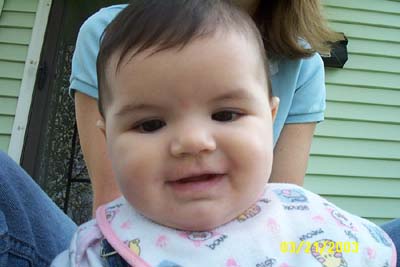 Ana on our front porch...