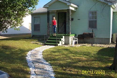 The sidewalk that Jake built - and Abby on the porch!