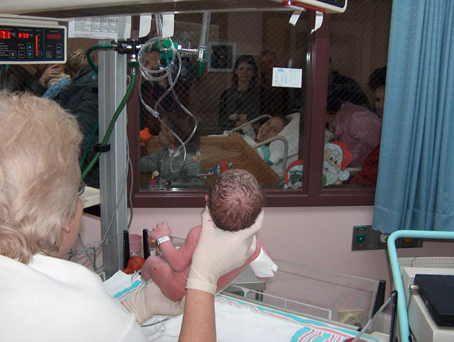 Mom gets to take a look before going to recovery