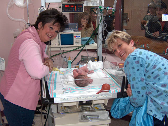 Two proud grandmas