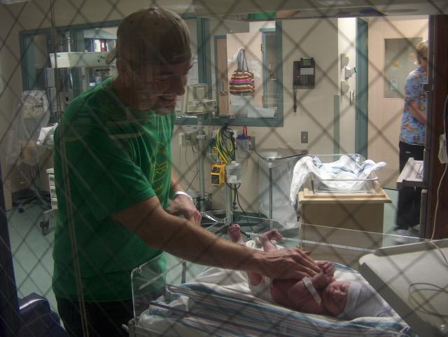 Daddy Kyle trying to keep Toren warm