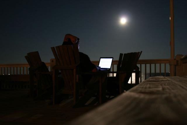 Jake catching up on work by moonlight