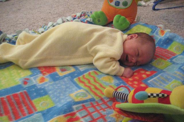 Not loving tummy time ~ April 16, 2009