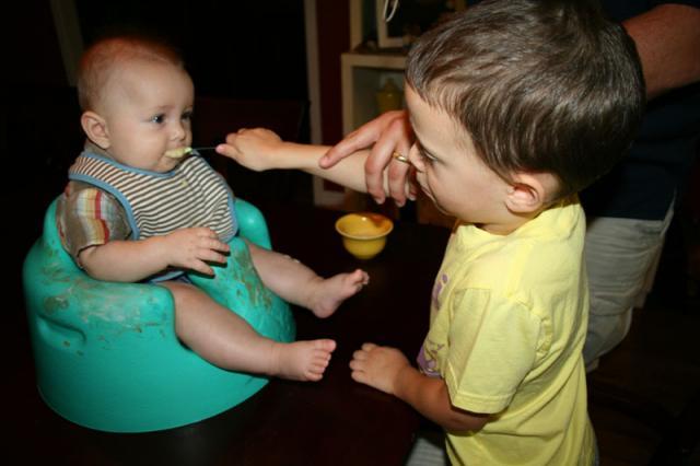 Big brother gets in on the feeding action ~ August 25, 2009