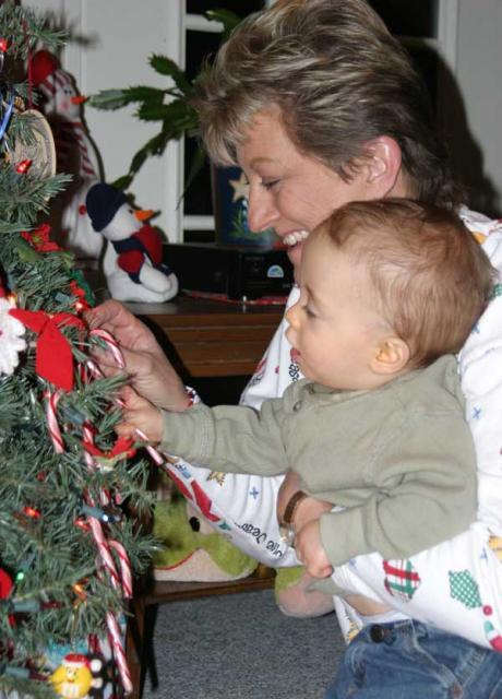 Hanging all the candy canes in one place (and Gammy didn't even rearrange them later!) ~ December 1, 2006