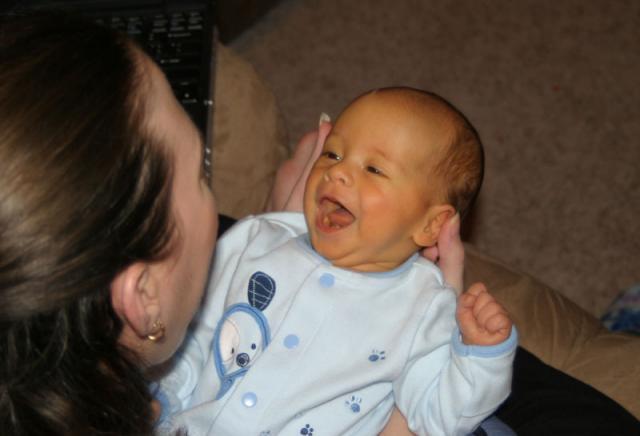 Finally, the first smile caught on camera! ~ January 31, 2006