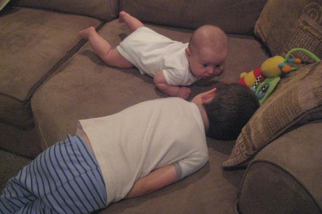 Entertaining baby brother for tummy time ~ July 1, 2009