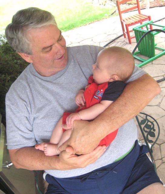 Granddaddy and Oliver hang out in the shade ~ July 4, 2009
