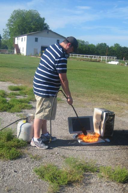 You'd never know this was his first time torching a computer ~ June 2, 2009