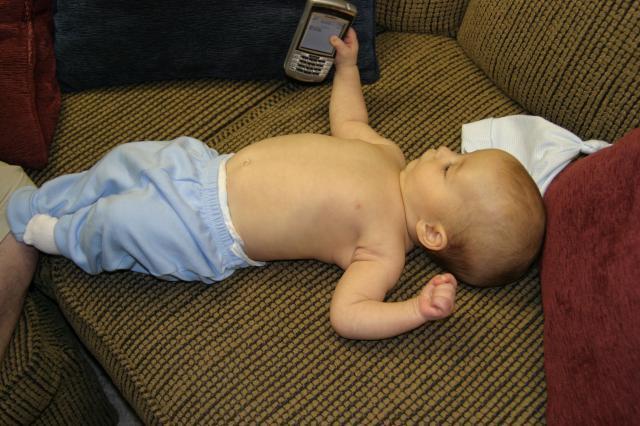 No shirt, but I got Daddy's blackberry! ~ March 19, 2006