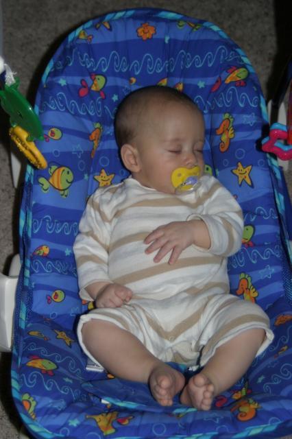 I'm exhausted (sleeping without being swaddled even!) ~ March 27, 2006