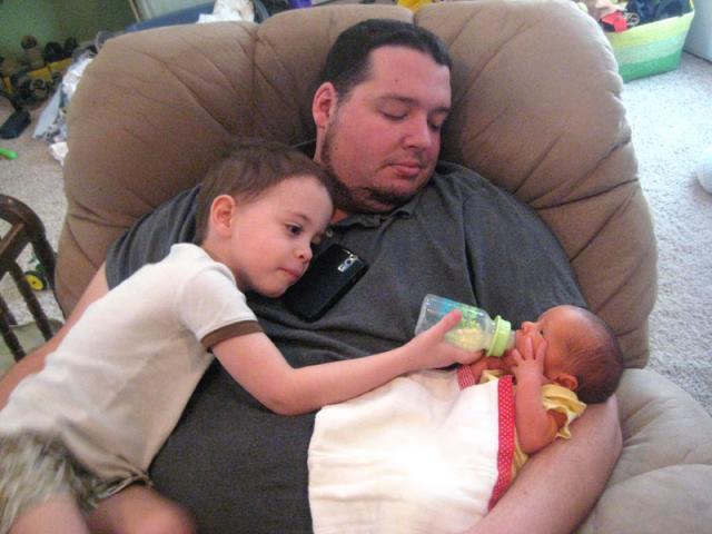 Helping with Oliver's first bottle of Mama's milk ~ March 5, 2009