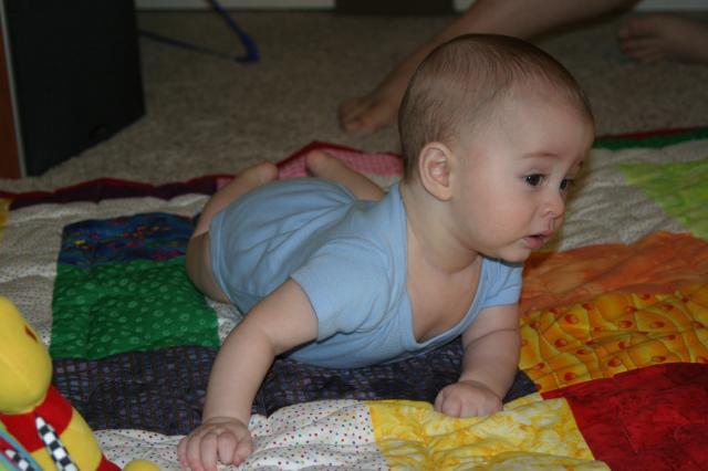 Whoa, did I just roll over? ~ May 15, 2006