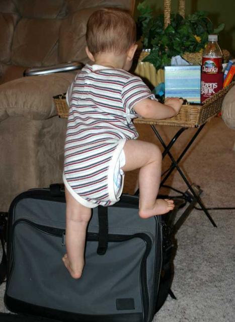 Using Daddy's laptop case as a stepstool ~ October 24, 2006