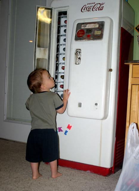 He can open the door, but he can't pull the drinks out -- yet ~ July 2, 2007