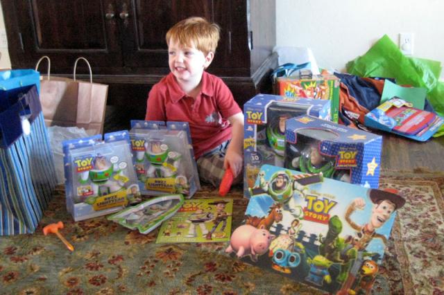 The birthday boy and all of his Buzz Lightyears