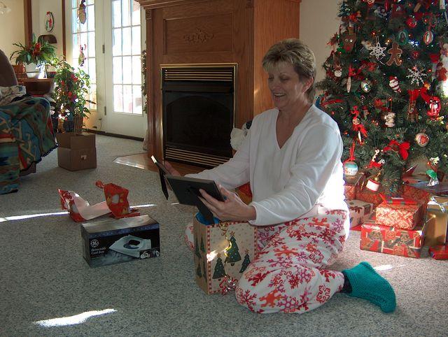 Candy admiring pictures of Jake & Abby