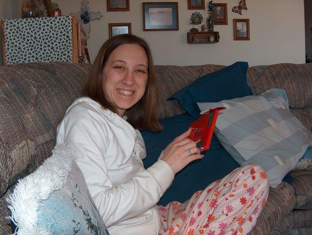 Abby opening a present (I think it was a CD)