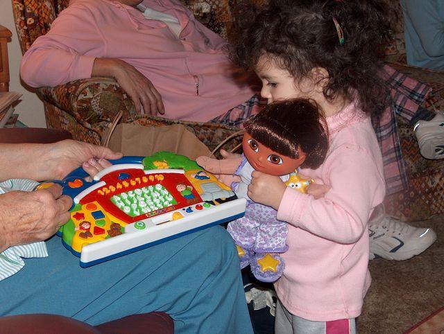 Dora playing with one of Ana's new toys