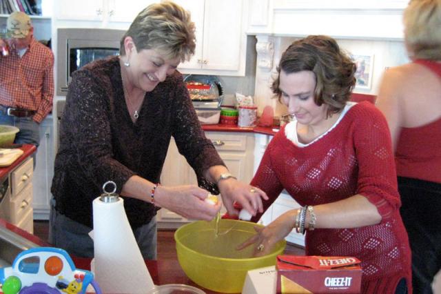 Jodi teaching Coco how to separate eggs