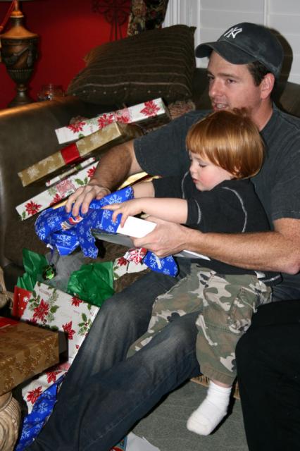 Toren working his way through his gift stack