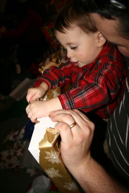 Tyler's getting good at unwrapping