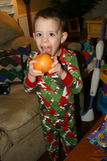 Mmmm, a grapefruit! (He really does like them!)