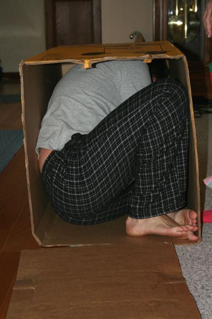 Uncle John doesn't quite fit in the box fort