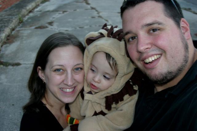 Family picture with a sleepy lion