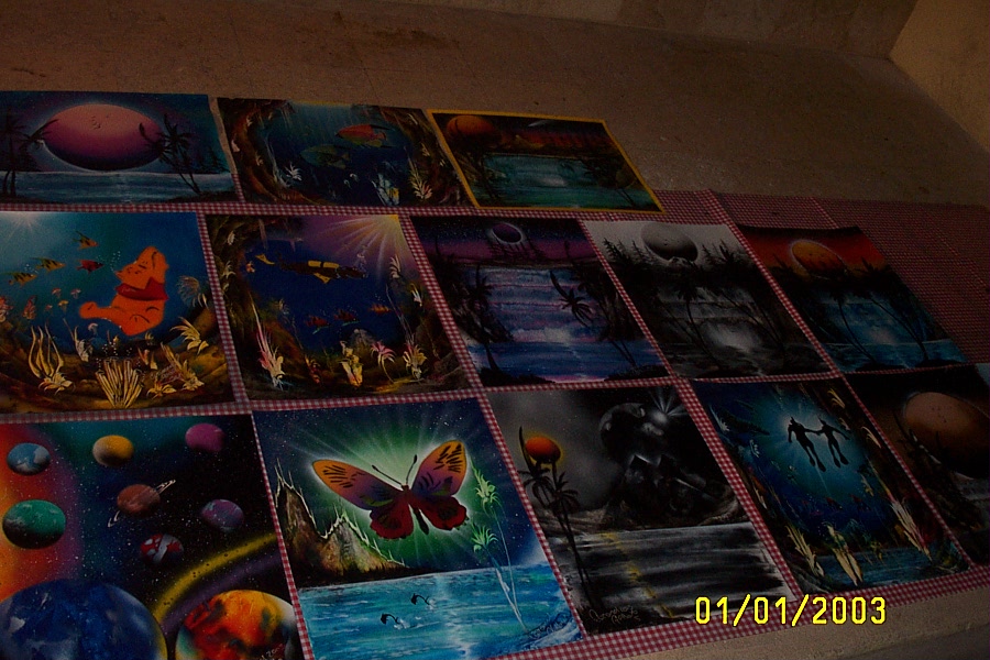 Mexican spray-painting artist's finished products; we bought two...