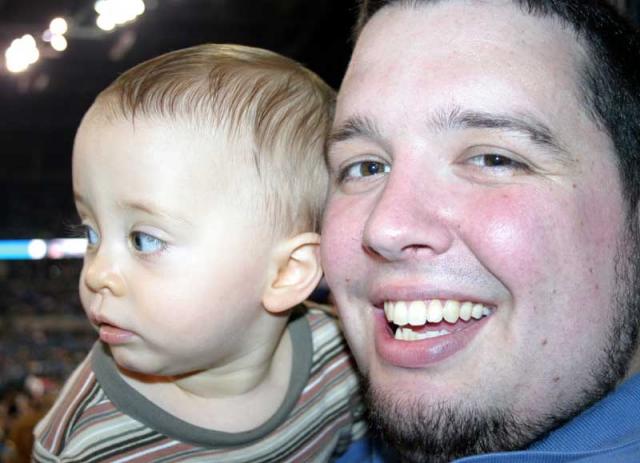 Tyler can't take his eyes off the game even for a picture!
