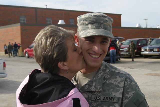Mom steals a kiss!