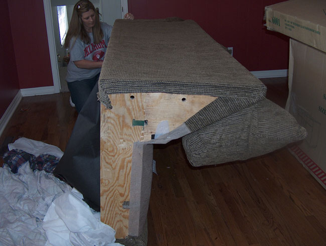 How we had to get the other part of the sectional upstairs -- take both edges off. (Sonja, a furniture repair person, came to our rescue!)
