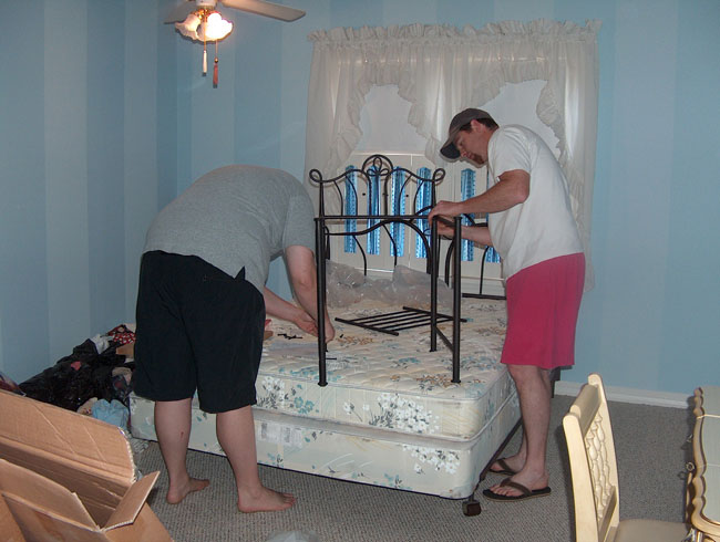 Jake & Kyle working on the guest bedroom set. Great shorts, Kyle!