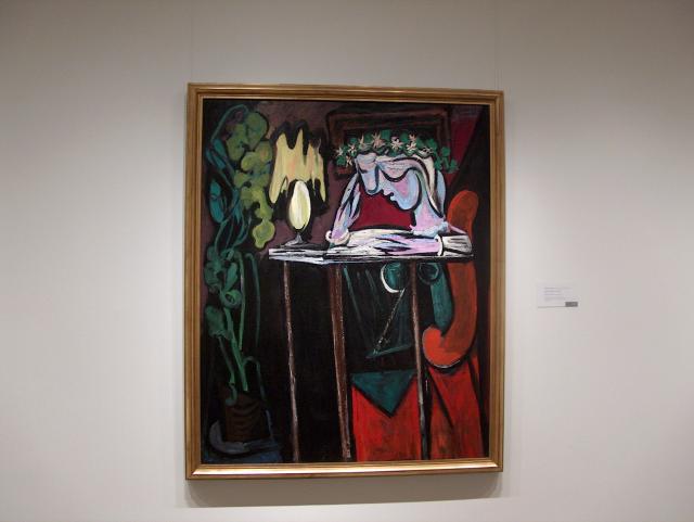 Girl Reading at a Table by Pablo Picasso