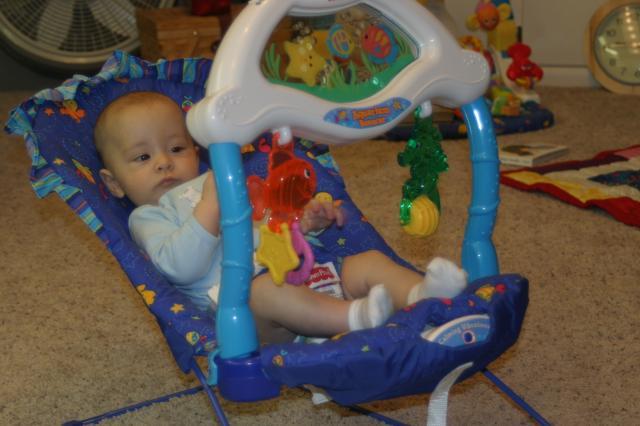 Playing in the bouncer for a few minutes
