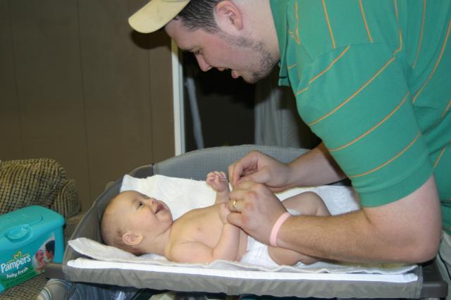 Daddy's home for lunch (and in time to take over diapering and dressing)!