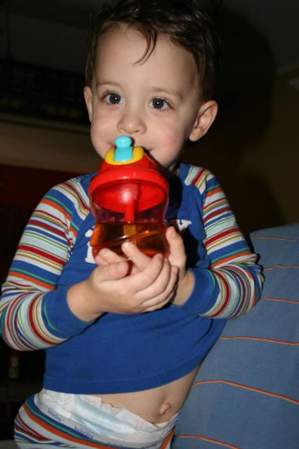 Needed a quick drink before bed (Yes, he's already learned this trick)