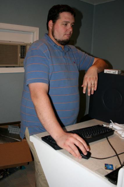 He always looks mad when he has to work back in his control room