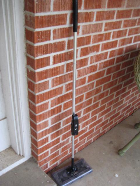 So I sucked him up in the swivel sweeper -- and put the whole thing out on the porch because I figured he'd escape that, too.