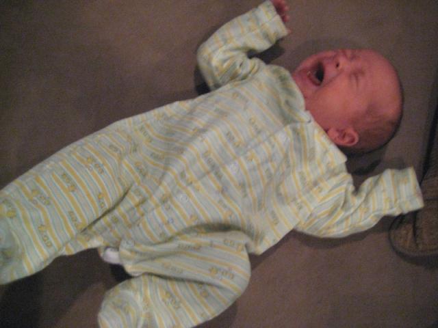 He's awake - and mad! (Diaper change.)
