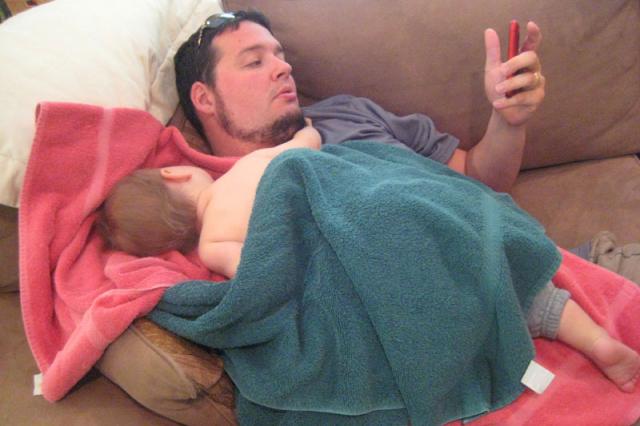 Time elapsed between last photo and this one: about 45 minutes. Times Oliver threw up all over both of us: about 4. Jake coming home from work so I could clean up myself and the aftermath: priceless.