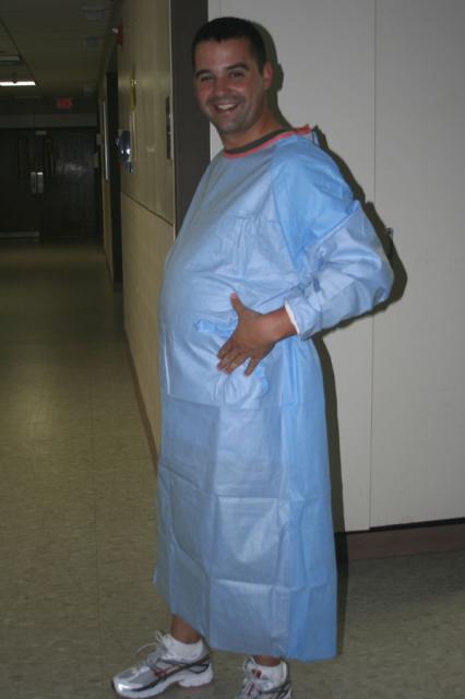 Kevin showing off his postpartum belly