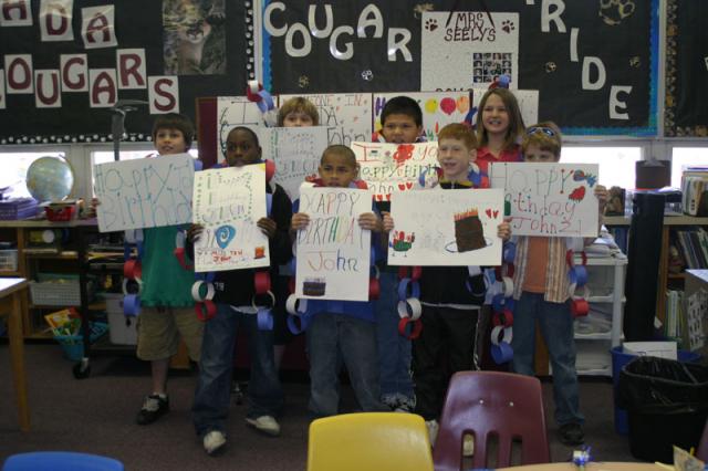 Showing off their signs