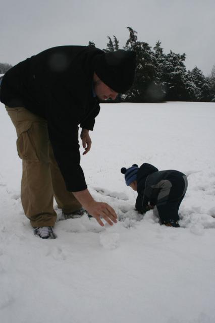 Building a tiny snowman. Hey, toddlers (and Jake) have very short attention spans!